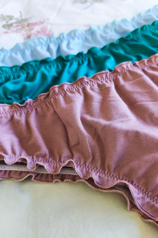 Detalle volado fru fru vedetina modal suave – Qué Tupé